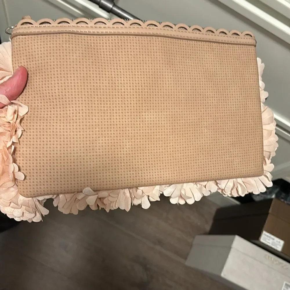 Stella and Dot floral clutch with 3D pastel pink floral, and floral interior
